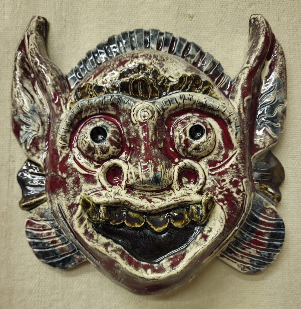 Picture of Balinese mask with horns and speckled glaze