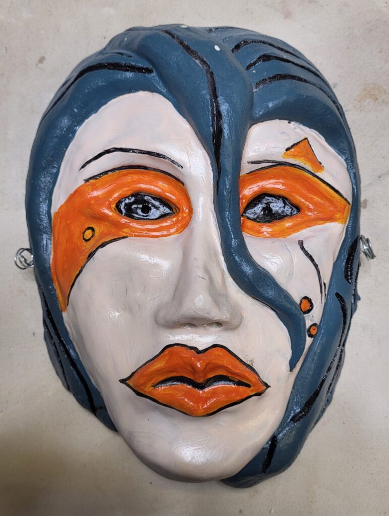 Art Deco designed mask of a woman