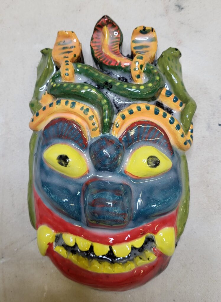 Brightly coloured mask from Sri Lanka